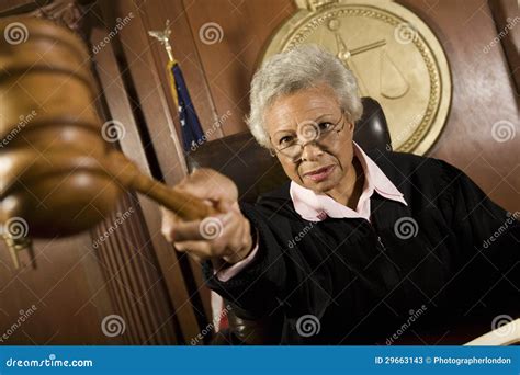 Female Judge With Wooden Gavel Stock Photo | CartoonDealer.com #71809932