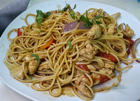 Tallarin Saltado De Pollo A Peruvian Stir Fried Noodle Delight