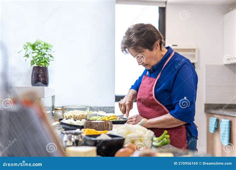 Granny Cooking At The Kitchen Counter Stock Image Image Of Traditional Recipe 270956169