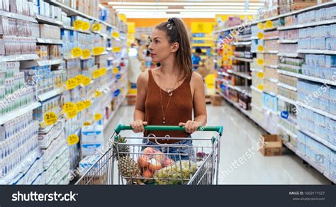 12 Woman Pushing Shopping Cart Stock Photo Images Stock Photos