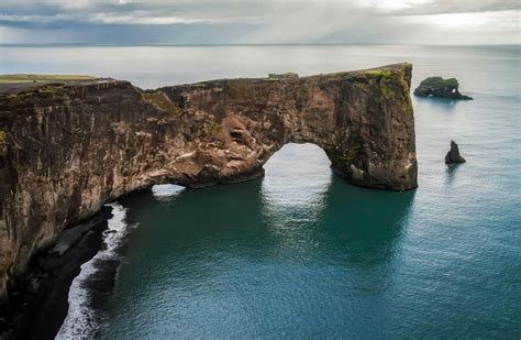 Scenic View Of Cliff By Sea Free Stock Photo