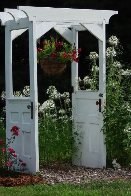 Old Doors Upcycled Into Garden Arbor Recyclart Garden Arbor Garden