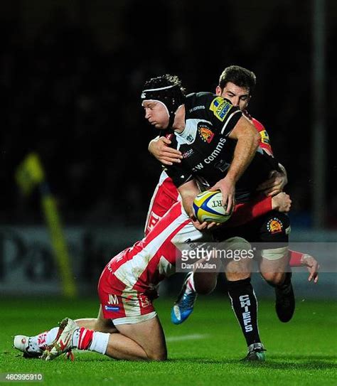 Thomas Waldrom Of Exeter Chiefs Is Tackled By Jonny May And Mark