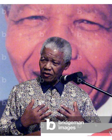 Image of SOUTH AFRICAN PRESIDENT NELSON MANDELA DELIVERS A SPEECH AFTER RECEIVING