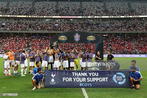 Tottenham Hotspur lift the winners trophy after the pre-season... News ...