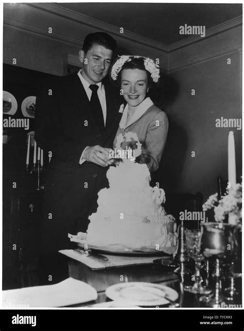 Photograph of Newlyweds Ronald Reagan and Nancy Reagan cutting their ...