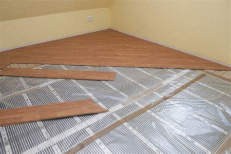 Теплый пол под ламинат на бетонный пол: варианты и технология укладки