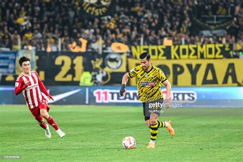 HAJISAFI of AEK FC competing with 33 INBEOM HWANG of Olympiacos FC ...