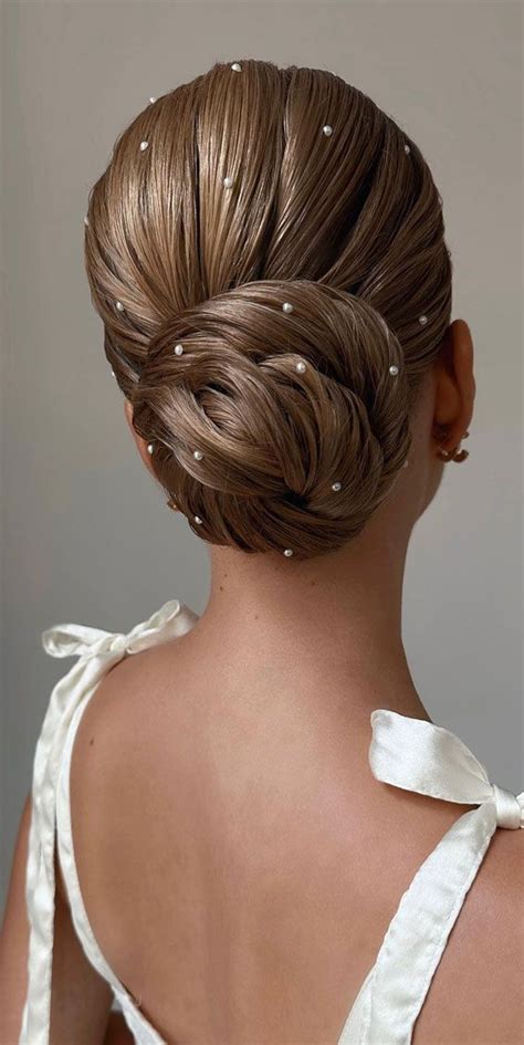 Chic Updos Elevate Your Hair Game With Sleek Low Bun And Pearls