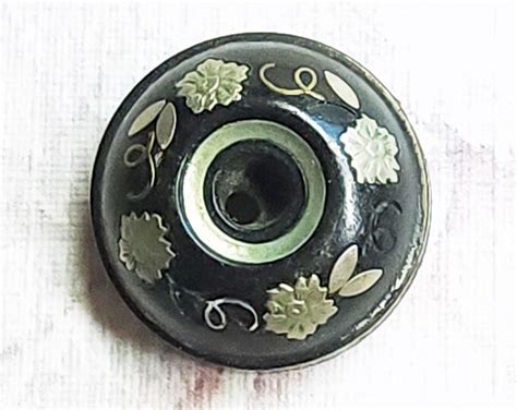 Antique Domed Black Horn Whistle Button With Silver White Metal Floral