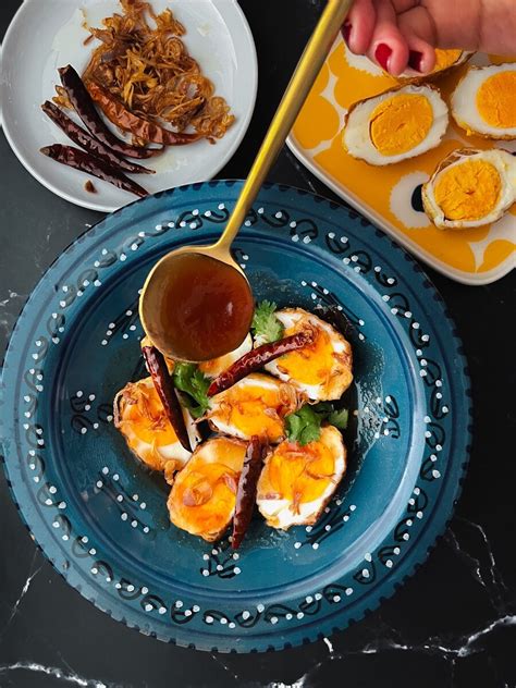 Authentic Thai Fried Eggs With Tamarind Sauce Kai Look Keuy Or Son In Law Eggs Recipe