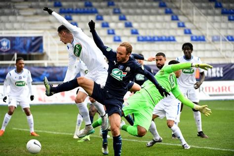 Les Maillots Du Match Aja Om Mis Aux Ench Res Au B N Fice Du District