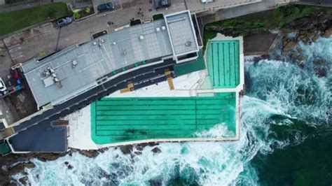 Drone Top Shot Over Bondi Beach Iceberg Stock Video Pond