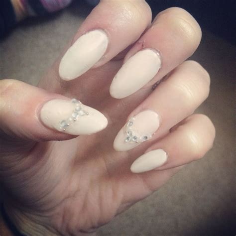 Pink Nude Acrylic Nails With Diamonds And Pearls