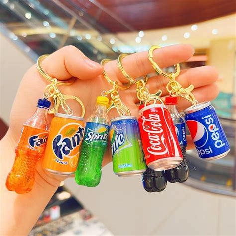 брелок Кока-четыре клюшонки-кола / Coca-Cola купить на OZON по низкой ...