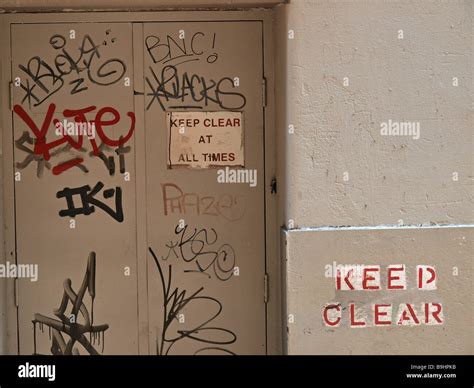 'KEEP CLEAR AT ALL TIMES' SIGN, AND 'KEEP CLEAR' STENCIL ON WALL, BY ...