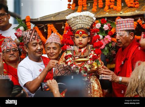 Caretakers Carry Nepals Living Goddess Kumari On Her Chariot During