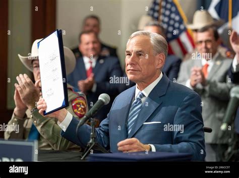 Texas Republican Governor Greg Abbott Holds Up A Bill After He Signs