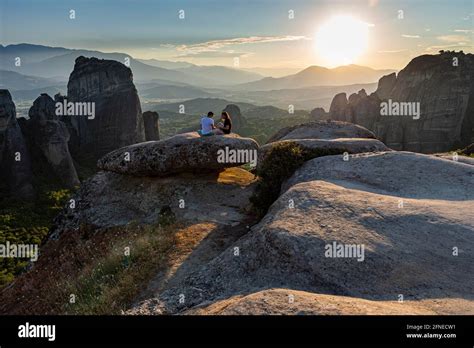watching mountainous sunset  res stock photography  images alamy