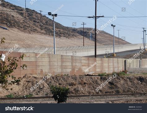 Us Mexico Border Fence On Tijuana Side Looking Into San Diego Stock