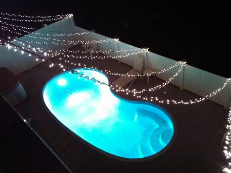 Lights over pool, beach wedding | Pool wedding, Backyard projects, Pool ...