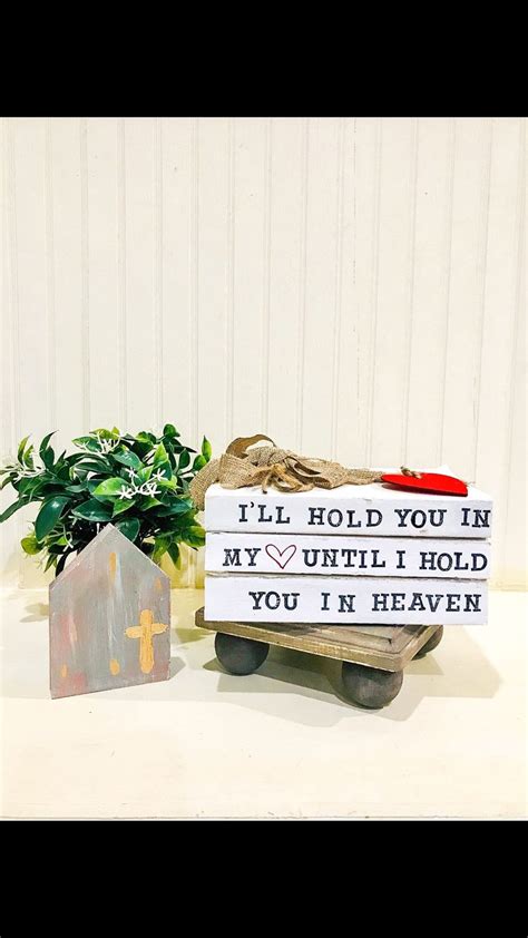 A Wooden Sign That Says I Ll Hold You In My Until I Hold You In Heaven