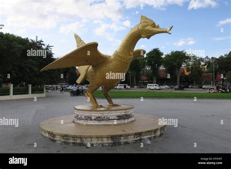 Hang The Sacred Golden Bird Statue In A Park South Of The Royal