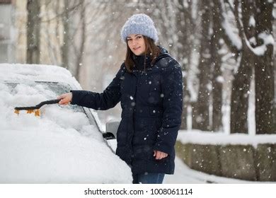 Woman Removing Snow Car Windshield Stock Photo Shutterstock