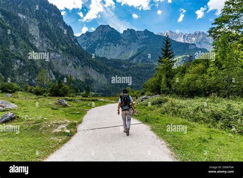 Tourist On The Hiking Trail From Saletalm To Obersee K Nigssee Behind