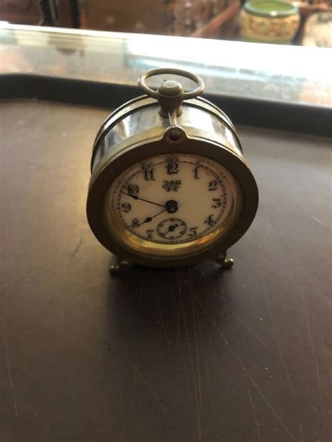 Antique Waterbury 1890s Brass And Glass Carriage Clockround Porcelain Face Antique Price