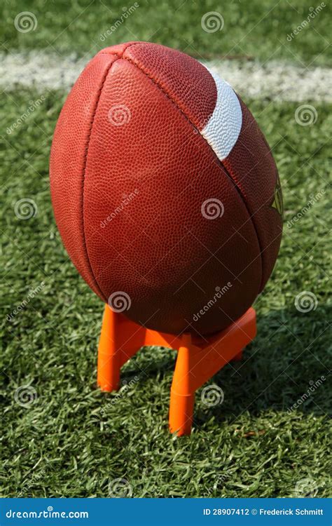 Football on a kicking tee stock photo. Image of place - 28907412