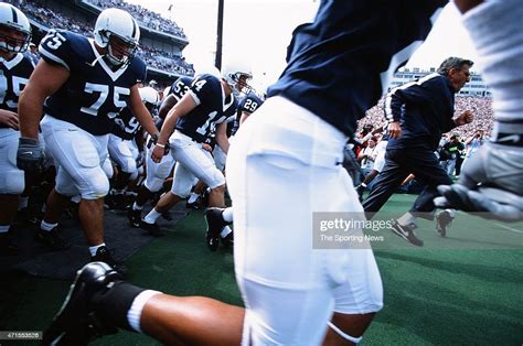 Joe Paterno Of The Penn State Nittany Lions Leads The Team Onto The