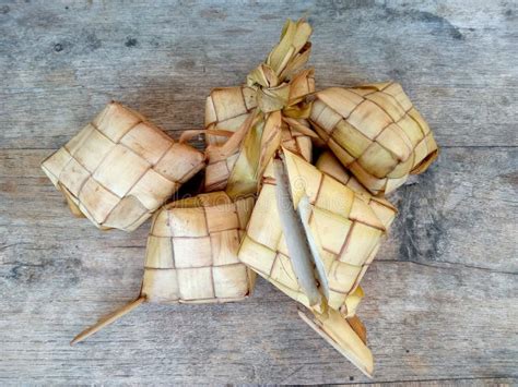 Rice Dumpling Or Tipat Ketupat On Wooden Background Stock Image Image