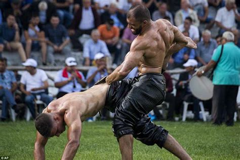 Greek wrestlers in olive oil put hands’ down rivals’ trousers to win ...