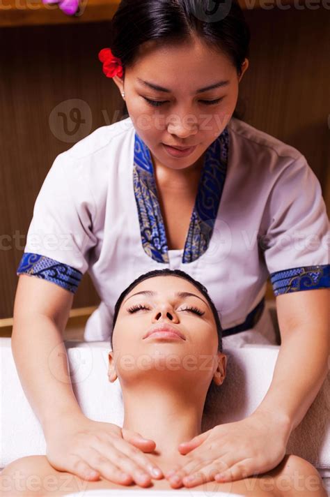 Spa Serenity Confident Thai Massage Therapist Massaging Beautiful