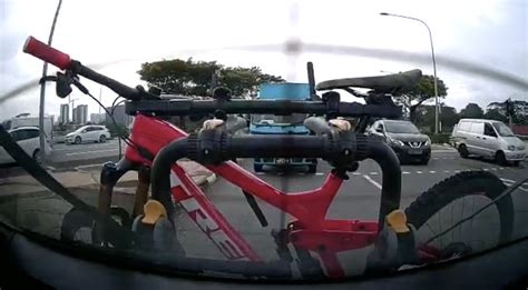 Lorry Rams Into Bike Propped On Spore Car Damage May Cost More Than