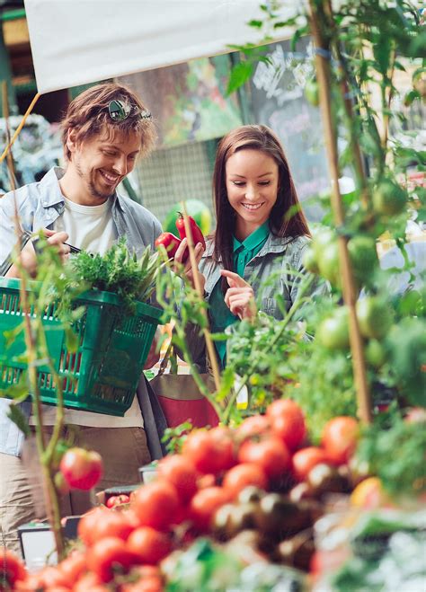 Couple Shopping At Fresh Foods Market By Stocksy Contributor Aila Images Stocksy