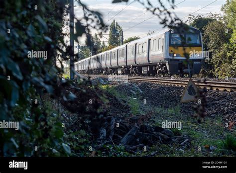 British Rail Class 321 Electric Multiple Unit Greater Anglia Railway Train Passing Hawkwell