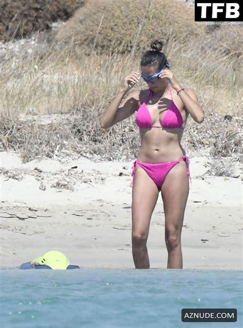 Andrea Schlager Sexy Seen Flaunting Her Hot Figure Wearing A Pink Bikini At The Beach In Greece