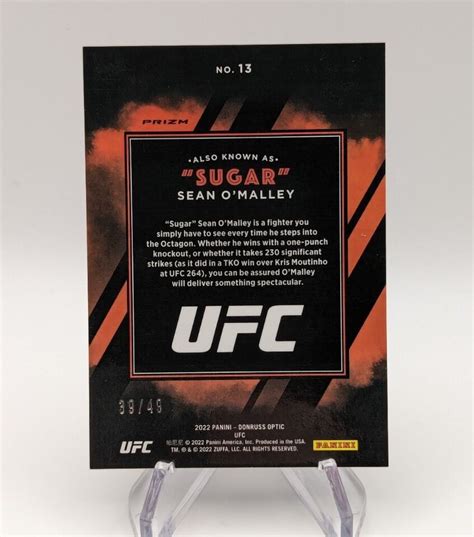 Sean O Malley 2022 Panini Optic UFC AKA Sugar 13 Blue Prizm SP D 49