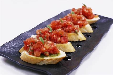 Classic Tomato Bruschetta Fresh Tomato Cubes Marinated In Olive Oil