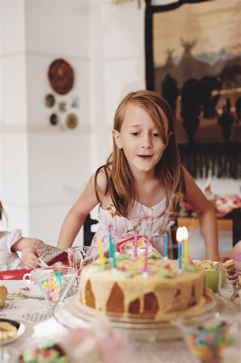 "Birthday Girl With Cake," by Stocksy Contributor "Gillian Vann" - Stocksy