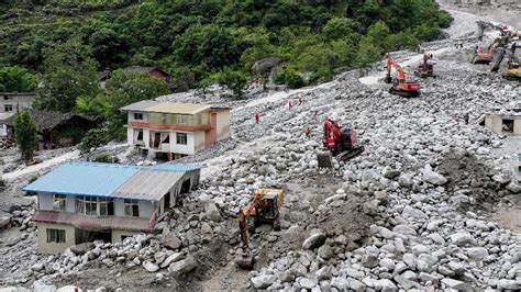 Deslizamento De Terra Deixa Mortos E Desaparecidos Na China