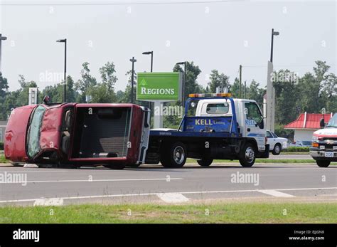 Overturned Vehicle Being Uprighted By Tow Truck Stock Photo Alamy