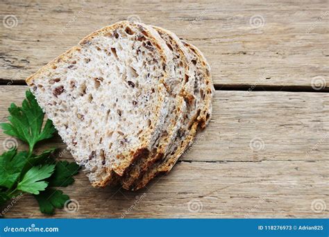 Slices Of Rustic Bread With Seeds Isolated On Wooden Table Or Background Stock Image Image Of