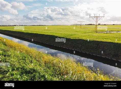 canal separates amsterdam schiphol airports airside  landside areas   polderbaan