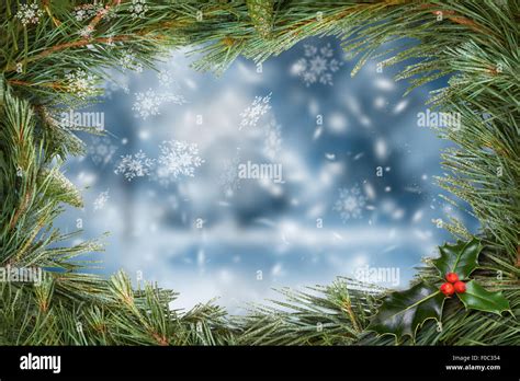 Traditional Christmas Tree Border With A Snow Scene Background Stock