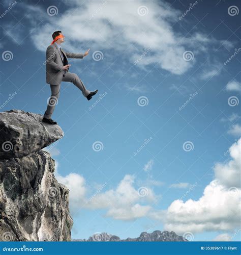 Stepping Off A Cliff Ledge Royalty Free Stock Photography - Image: 35389617