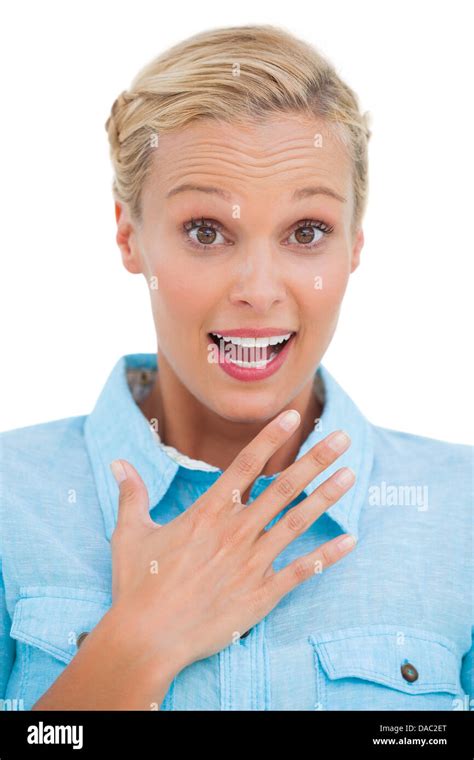 Surprised Blonde Looking At Camera With Hand Raised Stock Photo Alamy