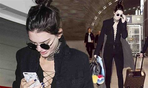 Kendall Jenner Exposes Her Chest In A Racy Super Plunging Lace Up Top